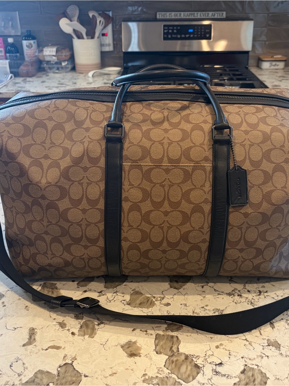 Coach Trekker 52” travel duffle.